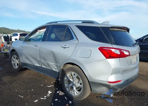 2018 Chevrolet Equinox Premier z USA, uszkodzony, nr VIN 2GNAXVEV1J6196158